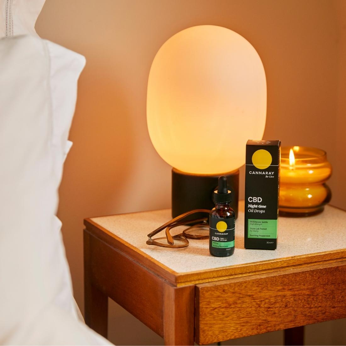 Night-Time CBD Oil Drops on bedside table